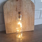 Flaschenvase mit Lichterkette